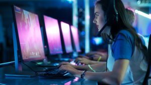 A Girl Playing Game on Computer